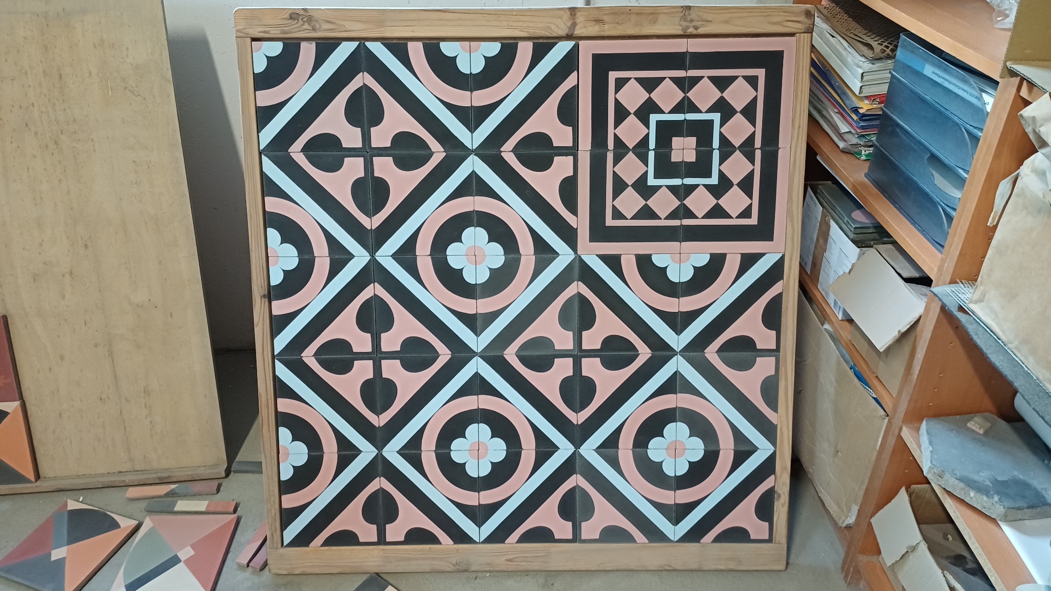 Purpura tile compositions in black, blush and pale blue