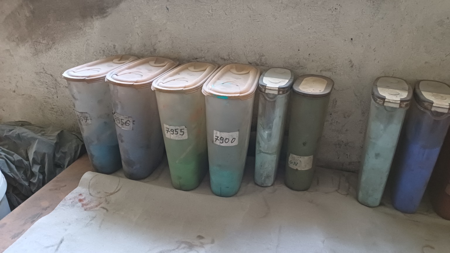 Containers of coloured pigments in the Purpura workshop